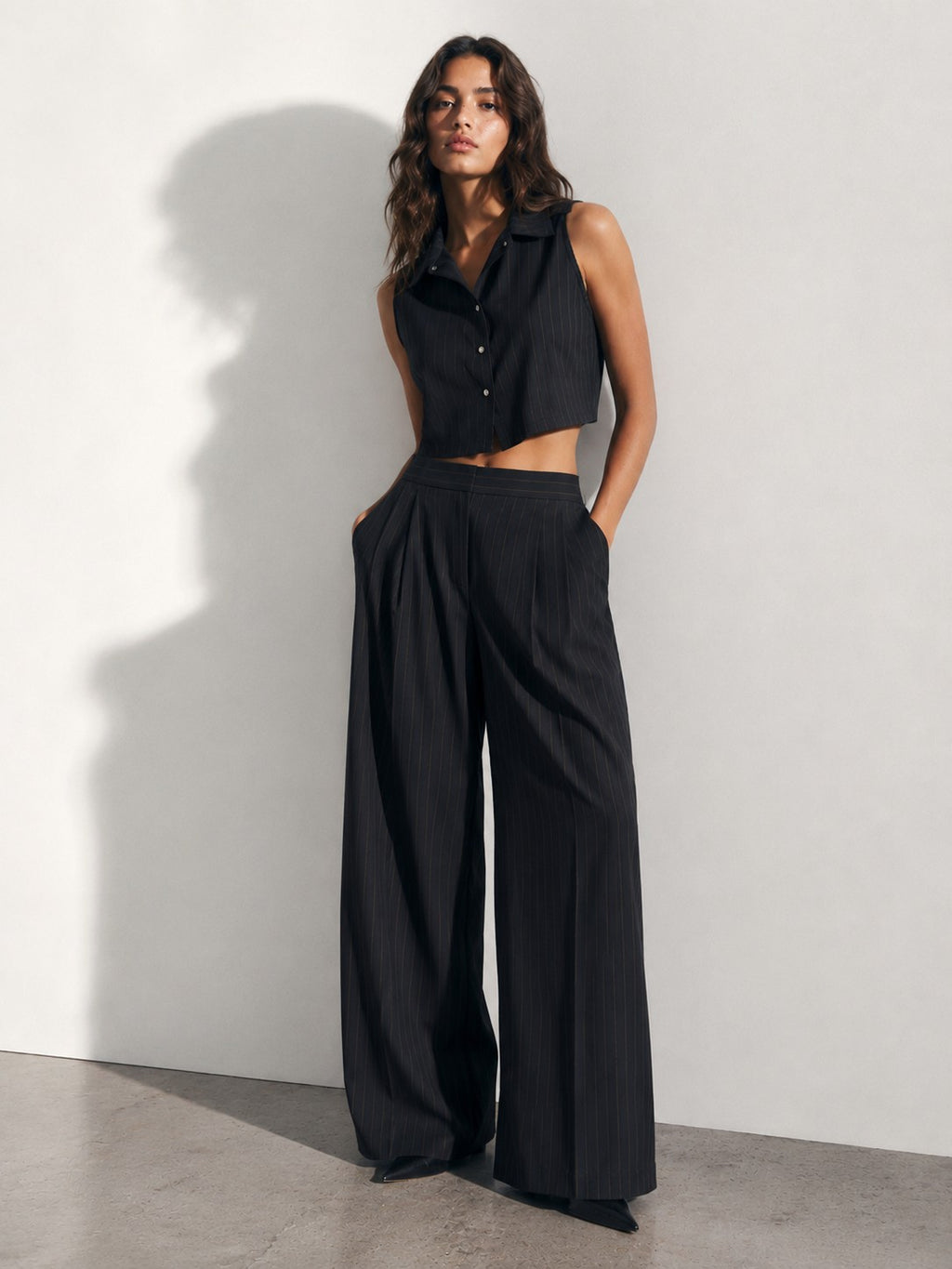 COORDINATO GESSATO TOP HALTER E PANTALONI PALAZZO