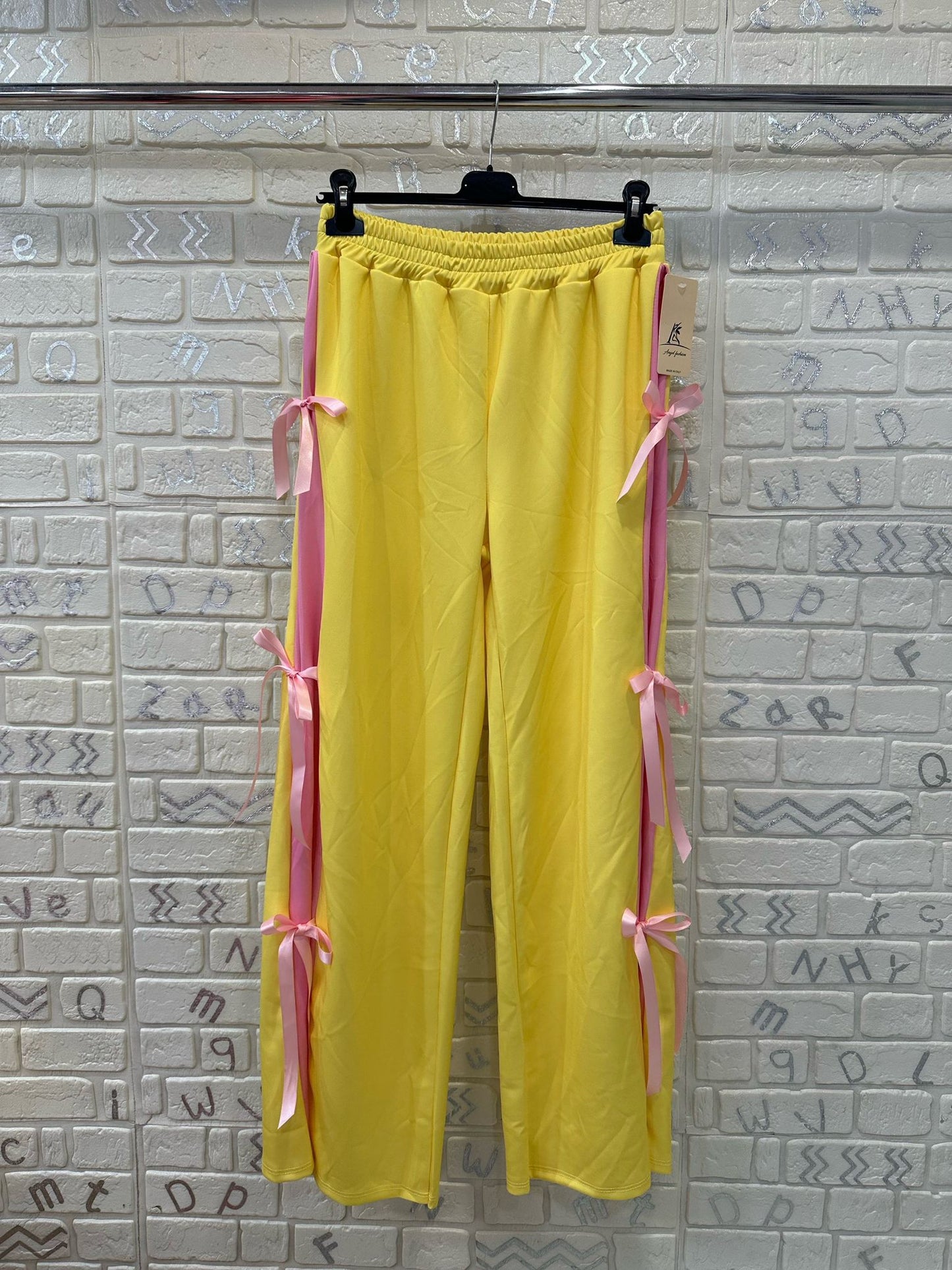 PANTALONI CON FIOCCHI